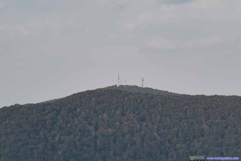 Signal Tower on Distant Mountains