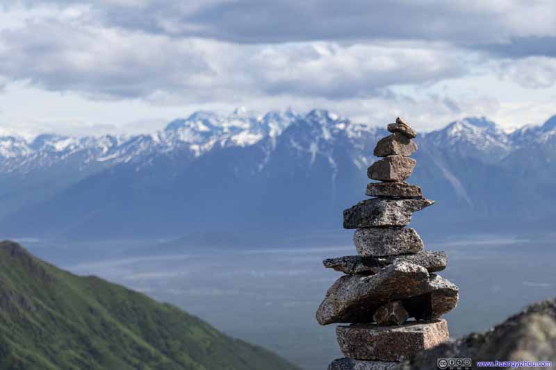 Cairn before Distant Mountains