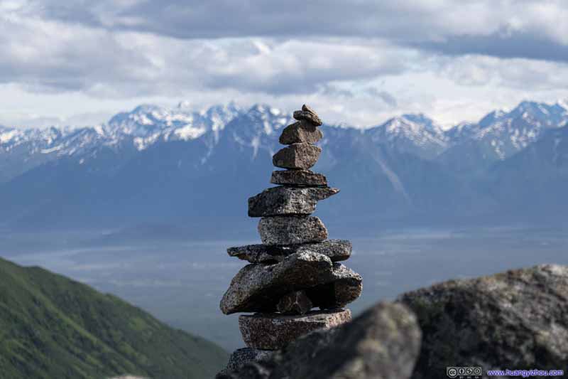 Cairn before Distant Mountains