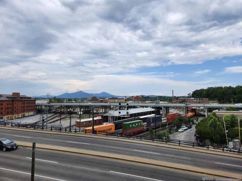 Train Yards and Distant Mountains