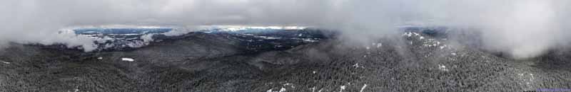View of Snow Covered Fields and Mountains
