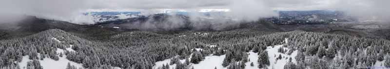 View of Snow Covered Fields and Mountains
