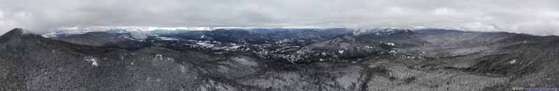 View of Snow Covered Fields and Mountains