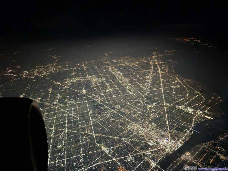 Flying over Detroit at Night
