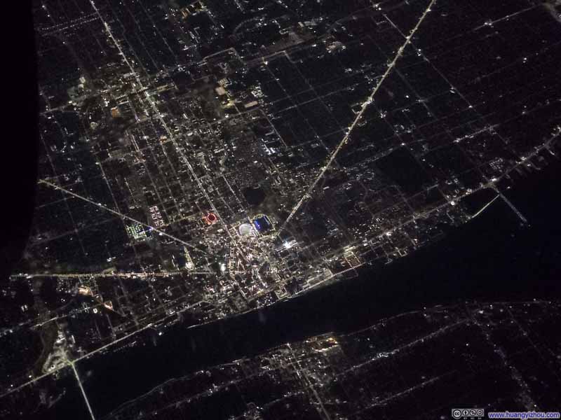 Flying over Detroit at Night