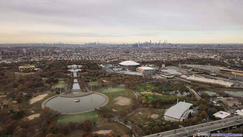 Flushing Meadows Corona Park before Distant New York City Skyline
