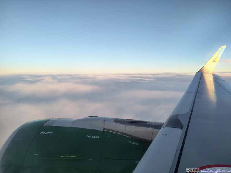 Clouds Reflecting Rising Sun