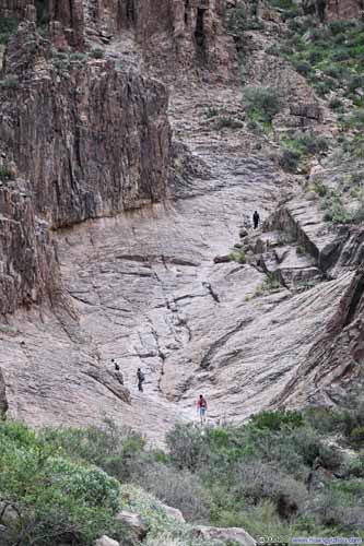 People Ascending Siphon Draw Slickrock