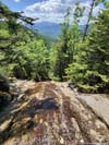 Sleek Rock Surface along Trail