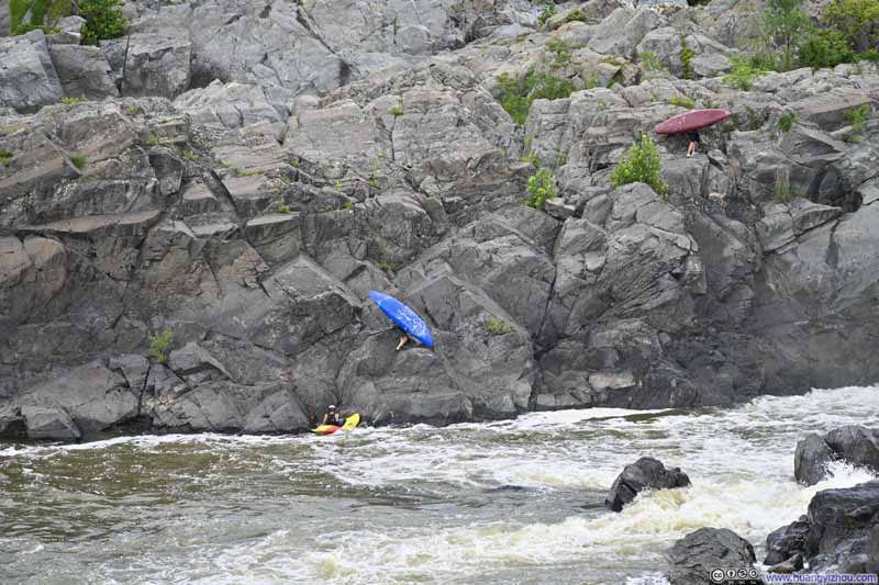 Kayakers Portaging around Great Falls